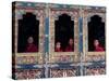 Buddhist Monks Look Through the Windows into the Courtyard of the Tango Monestary Near Thimphu-null-Stretched Canvas