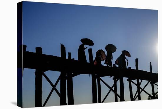 Buddhist Monks Silhouetted on the U Bein Bridge, Taungthman Lake, U Bein-Nathalie Cuvelier-Stretched Canvas