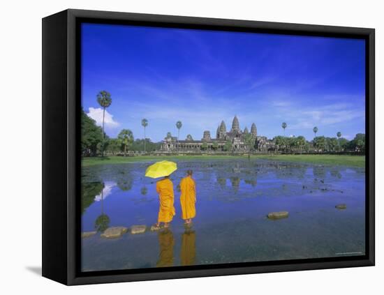 Buddhist Monks Standing in Front of Angkor Wat, Siem Reap, Cambodia-Gavin Hellier-Framed Stretched Canvas