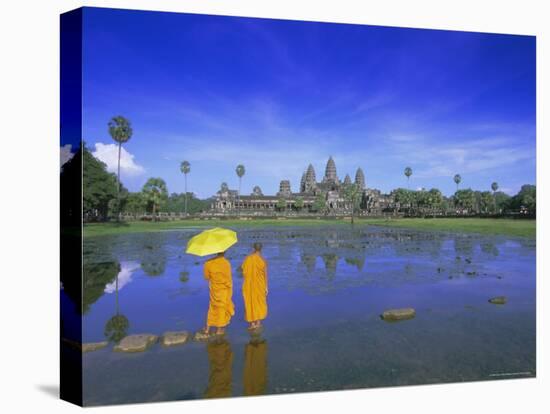 Buddhist Monks Standing in Front of Angkor Wat, Siem Reap, Cambodia-Gavin Hellier-Stretched Canvas