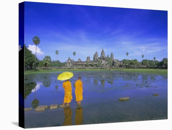 Buddhist Monks Standing in Front of Angkor Wat, Siem Reap, Cambodia-Gavin Hellier-Stretched Canvas