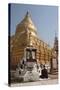 Buddhist Nun Meditating by Gold Stupa, Shwezigon Paya (Pagoda), Nyaung U-Stephen Studd-Stretched Canvas