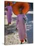 Buddhist Nuns with Bamboo-Framed Orange Umbrellas Walk Through Streets of Sittwe, Burma, Myanmar-Nigel Pavitt-Stretched Canvas