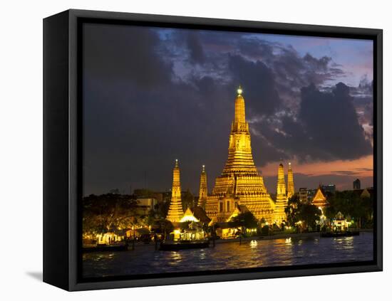 Buddhist Temple Lit Up at Dawn, Wat Arun, Chao Phraya River, Bangkok, Thailand-null-Framed Stretched Canvas