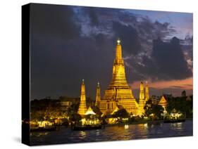 Buddhist Temple Lit Up at Dawn, Wat Arun, Chao Phraya River, Bangkok, Thailand-null-Stretched Canvas