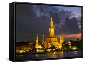 Buddhist Temple Lit Up at Dawn, Wat Arun, Chao Phraya River, Bangkok, Thailand-null-Framed Stretched Canvas