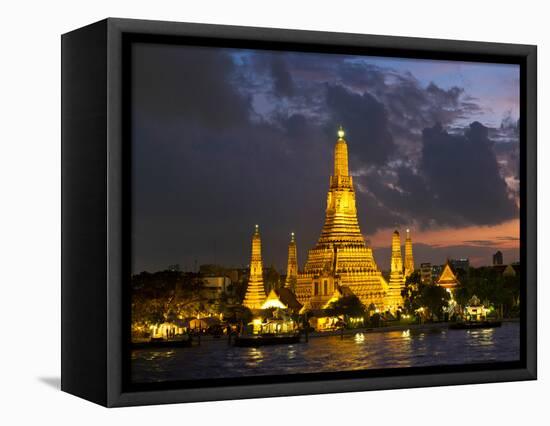 Buddhist Temple Lit Up at Dawn, Wat Arun, Chao Phraya River, Bangkok, Thailand-null-Framed Stretched Canvas