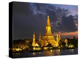 Buddhist Temple Lit Up at Dawn, Wat Arun, Chao Phraya River, Bangkok, Thailand-null-Stretched Canvas