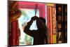 Buddhist worshipper burning incense sticks, Chua On Lang Taoist Temple-Godong-Mounted Photographic Print