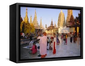 Buddhist Worshippers at the Shwedagon Paya (Shwe Dagon Pagoda), Yangon (Rangoon), Myanmar (Burma)-Christina Gascoigne-Framed Stretched Canvas