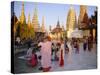 Buddhist Worshippers at the Shwedagon Paya (Shwe Dagon Pagoda), Yangon (Rangoon), Myanmar (Burma)-Christina Gascoigne-Stretched Canvas