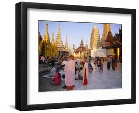 Buddhist Worshippers at the Shwedagon Paya (Shwe Dagon Pagoda), Yangon (Rangoon), Myanmar (Burma)-Christina Gascoigne-Framed Photographic Print