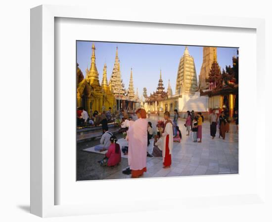 Buddhist Worshippers at the Shwedagon Paya (Shwe Dagon Pagoda), Yangon (Rangoon), Myanmar (Burma)-Christina Gascoigne-Framed Photographic Print