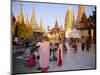 Buddhist Worshippers at the Shwedagon Paya (Shwe Dagon Pagoda), Yangon (Rangoon), Myanmar (Burma)-Christina Gascoigne-Mounted Photographic Print