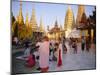 Buddhist Worshippers at the Shwedagon Paya (Shwe Dagon Pagoda), Yangon (Rangoon), Myanmar (Burma)-Christina Gascoigne-Mounted Photographic Print