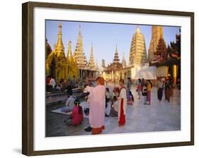 Buddhist Worshippers at the Shwedagon Paya (Shwe Dagon Pagoda), Yangon (Rangoon), Myanmar (Burma)-Christina Gascoigne-Framed Photographic Print