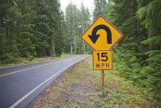 A Signpost on a Forest Road Warning of a U Turn in the Cascade Mountains of Central Oregon-Buddy Mays-Photographic Print