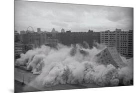 Building Complex falling amidst Dust-null-Mounted Premium Photographic Print