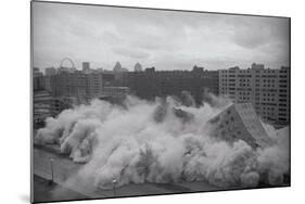 Building Complex falling amidst Dust-null-Mounted Photographic Print