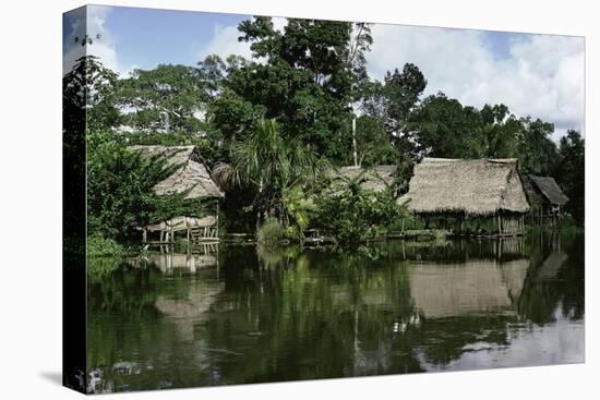 Building on Stilts Reflected in the River Amazon, Peru, South America-Sybil Sassoon-Stretched Canvas