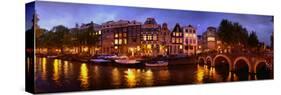 Buildings Along a Canal at Dusk, Amsterdam, Netherlands-null-Stretched Canvas