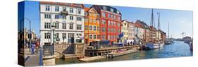 Buildings Along a Canal with Boats, Nyhavn, Copenhagen, Denmark-null-Stretched Canvas