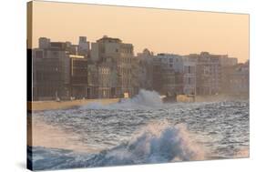 Buildings Along the Malecon in Soft Evening Sunlight with Large Waves Crashing Against the Sea Wall-Lee Frost-Stretched Canvas