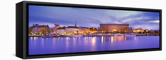 Buildings at the Waterfront Lit Up at Dusk, Stockholm, Sweden-null-Framed Stretched Canvas