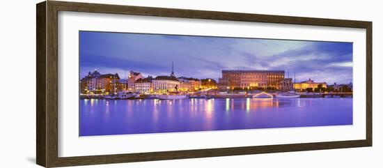 Buildings at the Waterfront Lit Up at Dusk, Stockholm, Sweden-null-Framed Photographic Print