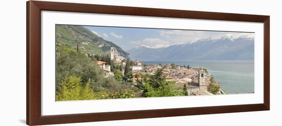 Buildings at the Waterfront with Snowcapped Mountain in the Background, Gargnano, Monte Baldo-null-Framed Photographic Print