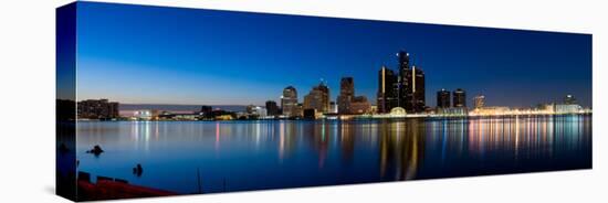 Buildings in a City Lit Up at Dusk, Detroit River, Detroit, Michigan, USA-null-Stretched Canvas