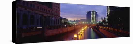 Buildings Lit Up at Dusk, Waterfire, Providence River, Providence, Providence County-null-Stretched Canvas
