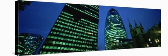 Buildings Lit Up at Night, Sir Norman Foster Building, Swiss Re Tower, London, England-null-Stretched Canvas