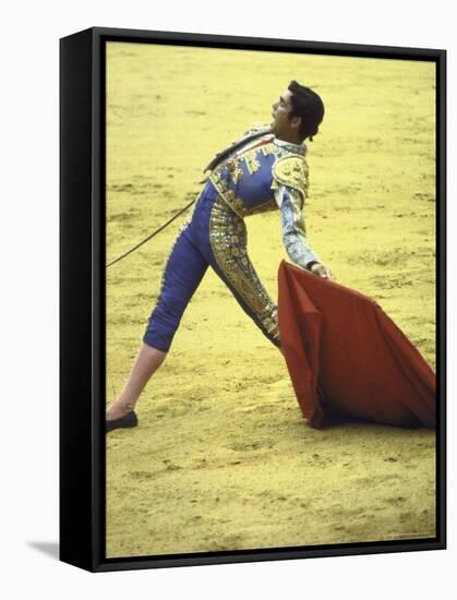 Bullfighter Francisco Ribera, Known as "Paquirri," Leaning Back in the Ring-Loomis Dean-Framed Stretched Canvas