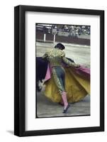 Bullfighter Manuel Benitez, Known as "El Cordobes," Sweeping His Cape Aside a Charging Bull-Loomis Dean-Framed Photographic Print