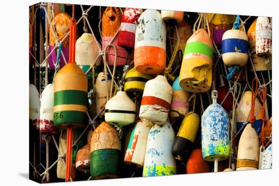 Buoys on a Wall at Apalachicola, Florida, USA-Joanne Wells-Stretched Canvas