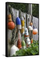 Buoys outside Lucy J's Jewelry and Glass Studio, Eastham, Cape Cod, Massachusetts, USA-Susan Pease-Framed Stretched Canvas