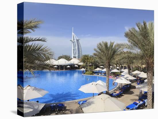 Burj Al Arab Seen From the Swimming Pool of the Madinat Jumeirah Hotel, Jumeirah Beach, Dubai, Uae-Amanda Hall-Stretched Canvas