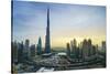 Burj Khalifa and Downtown Dubai at sunset, Dubai, United Arab Emirates, Middle East-Fraser Hall-Stretched Canvas