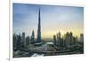 Burj Khalifa and Downtown Dubai at sunset, Dubai, United Arab Emirates, Middle East-Fraser Hall-Framed Photographic Print