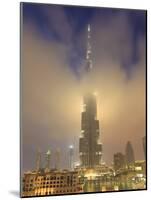 Burj Khalifa Illuminates the Clouds and Surrounding Skyline at Night, Downtown, Dubai, Uae-Amanda Hall-Mounted Photographic Print
