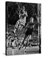 Burke Scott of Hoosiers Basketball Team Leaping Through Air Towards Lay Up Shot at Basketball Hoop-Francis Miller-Stretched Canvas