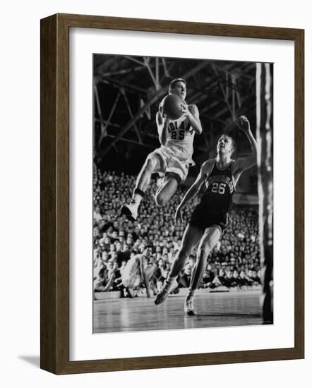 Burke Scott of Hoosiers Basketball Team Leaping Through Air Towards Lay Up Shot at Basketball Hoop-Francis Miller-Framed Premium Photographic Print