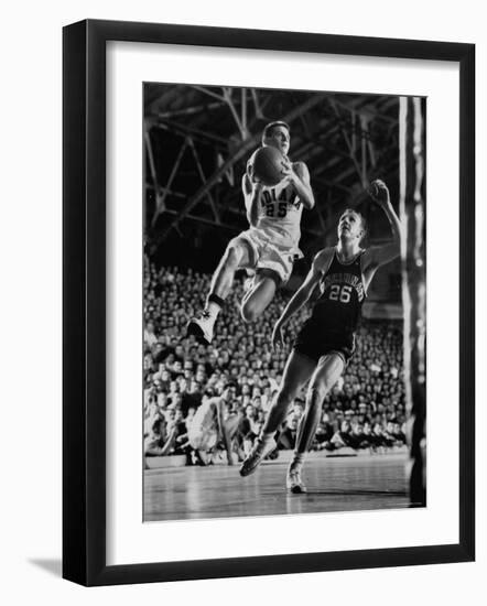 Burke Scott of Hoosiers Basketball Team Leaping Through Air Towards Lay Up Shot at Basketball Hoop-Francis Miller-Framed Premium Photographic Print