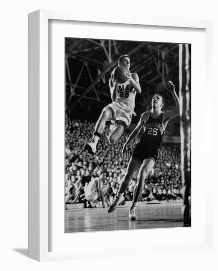 Burke Scott of Hoosiers Basketball Team Leaping Through Air Towards Lay Up Shot at Basketball Hoop-Francis Miller-Framed Photographic Print