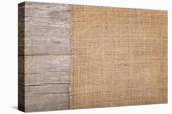 Burlap Texture on Wooden Table Background-karandaev-Stretched Canvas