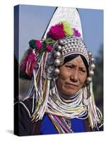 Burma, Kengtung, A Mong La Akha Woman Wearing a Traditional Headdress of Silver and Beads, Myanmar-Nigel Pavitt-Stretched Canvas