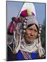 Burma, Kengtung, A Mong La Akha Woman Wearing a Traditional Headdress of Silver and Beads, Myanmar-Nigel Pavitt-Mounted Photographic Print