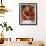 Burma, Lake Inle, A Young Novice Monk Learning at a Monastery School on Lake Inle, Myanmar-Nigel Pavitt-Framed Photographic Print displayed on a wall