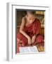 Burma, Lake Inle, A Young Novice Monk Learning at a Monastery School on Lake Inle, Myanmar-Nigel Pavitt-Framed Photographic Print